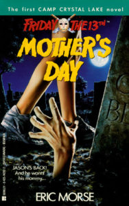 Cover of Eric Morse's pamphlet entitled Friday the Thirteenth: Mother's Day, featuring a ghastly hand bursting from the earth to grab the ankle of a young woman wearing sneakers.